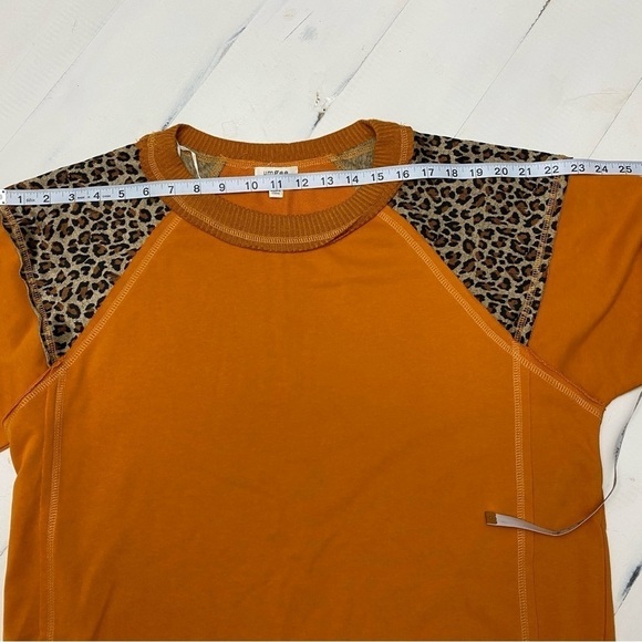 Umgee French Terry, animal print raw edge detail tunic with side slits medium - Picture 11 of 14